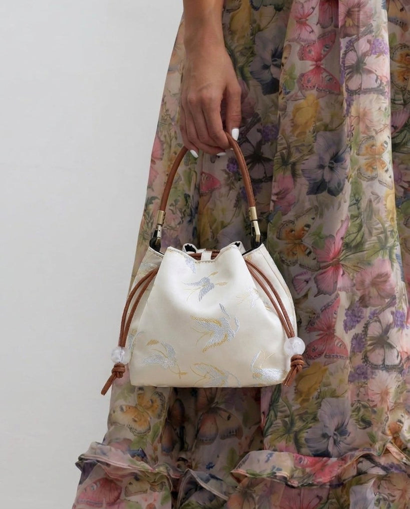 The Brocade Bucket Bag — worn