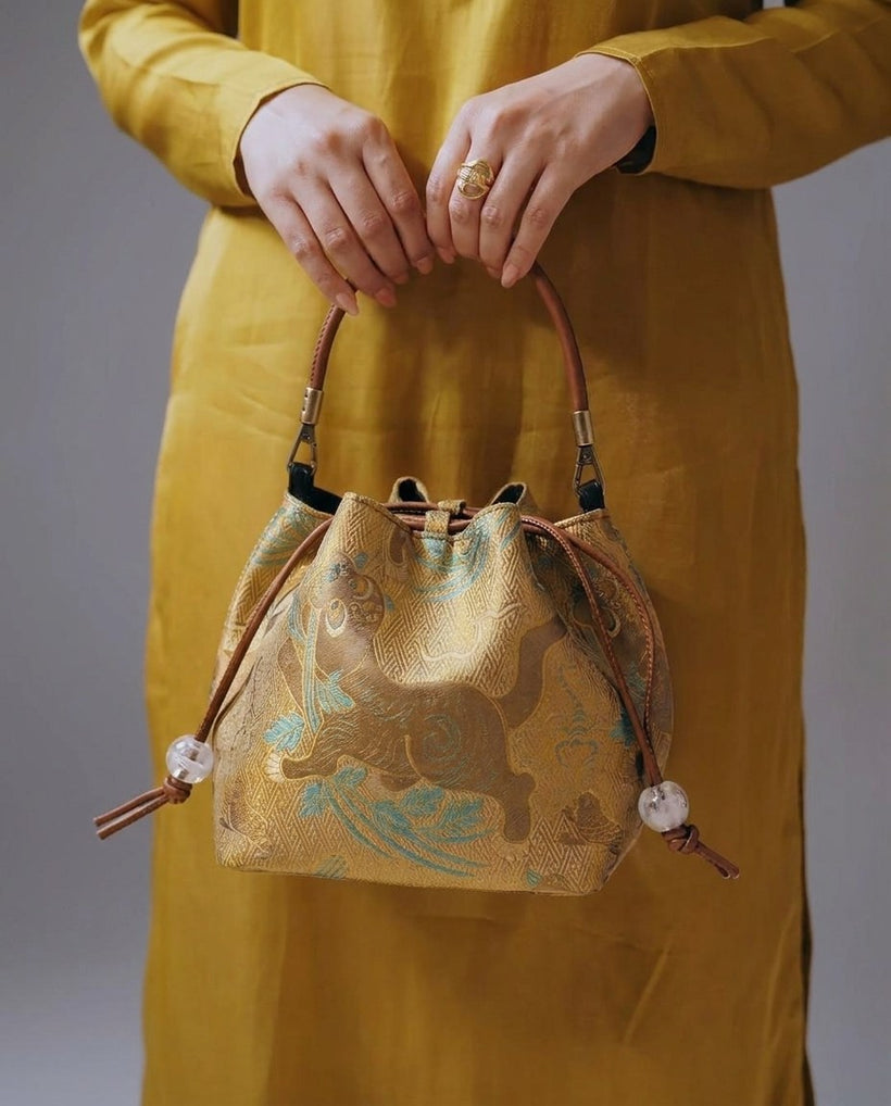 The Brocade Bucket Bag — worn