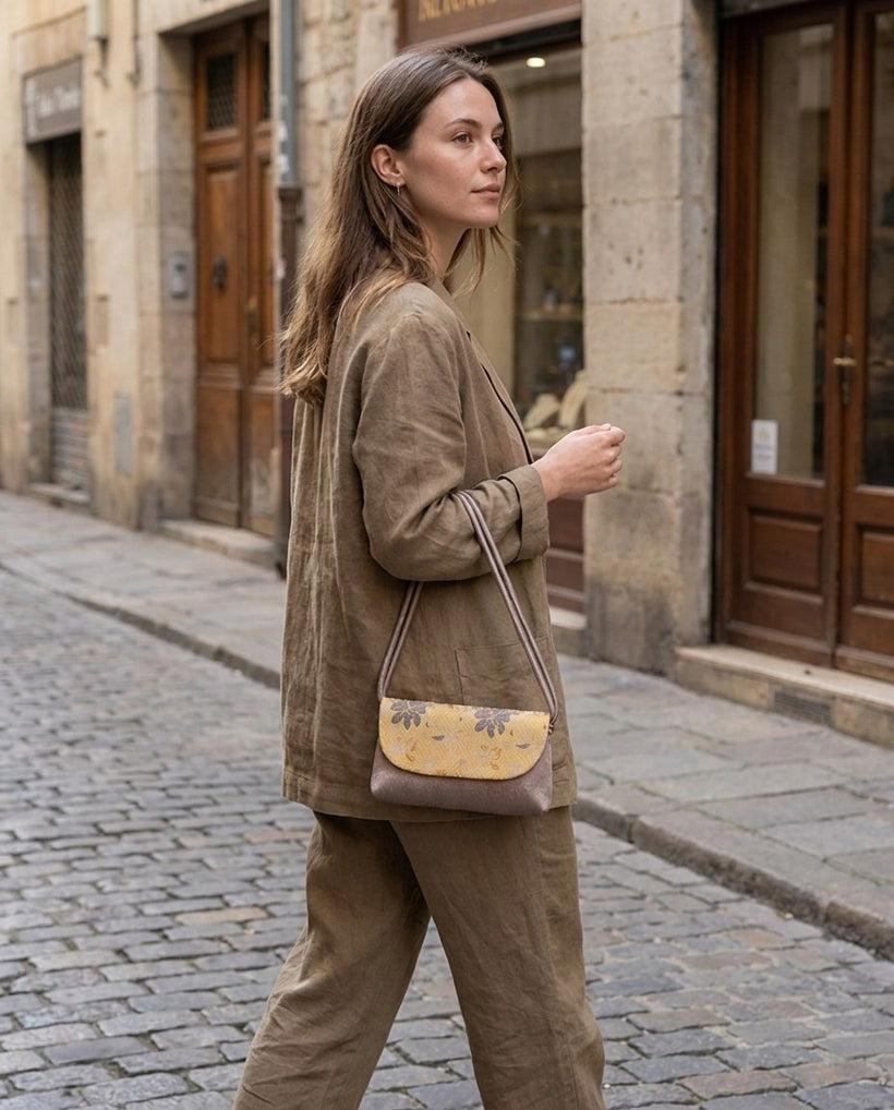 The Brocade Flap Crossbody — worn