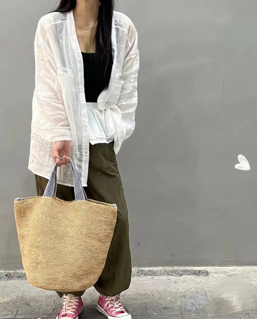 The Taormina Raffia Tote — worn
