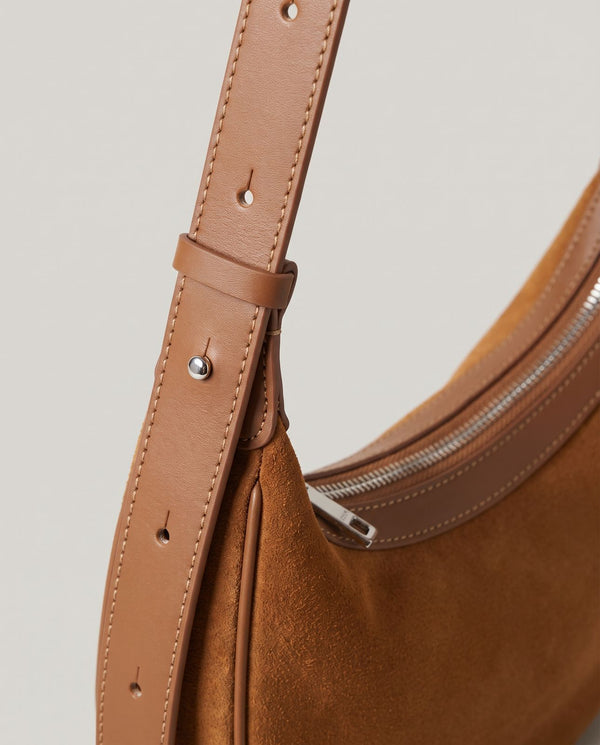 Cassis Crescent Bag strap — smooth leather, punched holes, silver-tone rivets