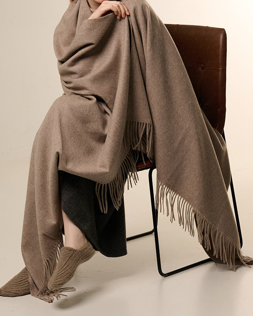 The Nomad Lambswool Blanket-Wrap, styled 1