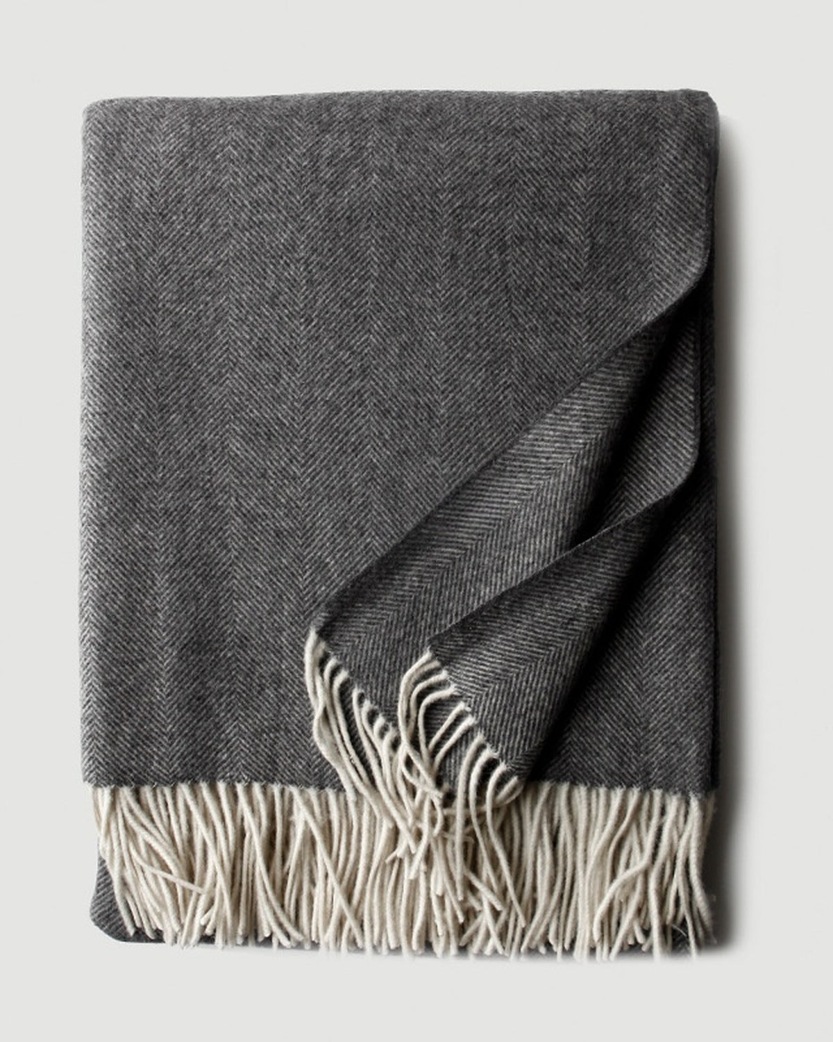 The Herringbone Cashmere-Blend Throw in Dark Grey