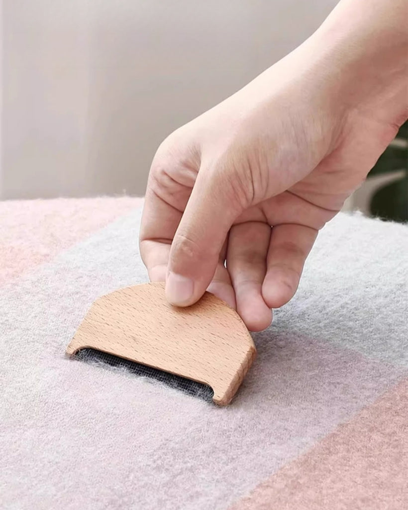 The Beechwood Cashmere Comb in use, view 2