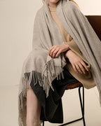 The Nomad Lambswool Blanket-Wrap in Grey