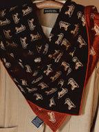 Wildfool 85cm carriage scarf folded to show black and brick-red reversible sides together