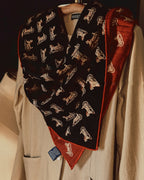 Wildfool 85cm carriage scarf folded to show black and brick-red reversible sides together