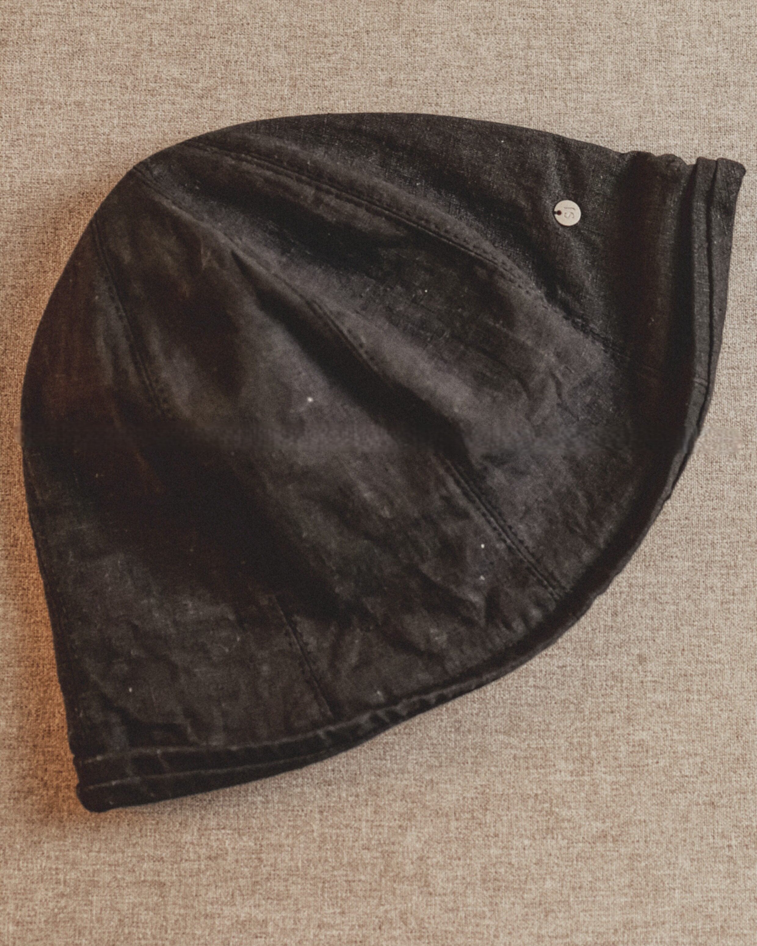 Wildfool Washed Linen Docker Cap in Black — front view