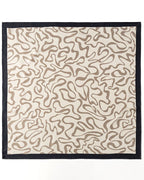 Close-up showing warm brown brushstroke-like curves flowing across mulberry silk in Matisse-inspired design