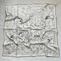 Wildfool 88cm mulberry silk scarf with line-drawn rabbit print — full flat lay on cream linen