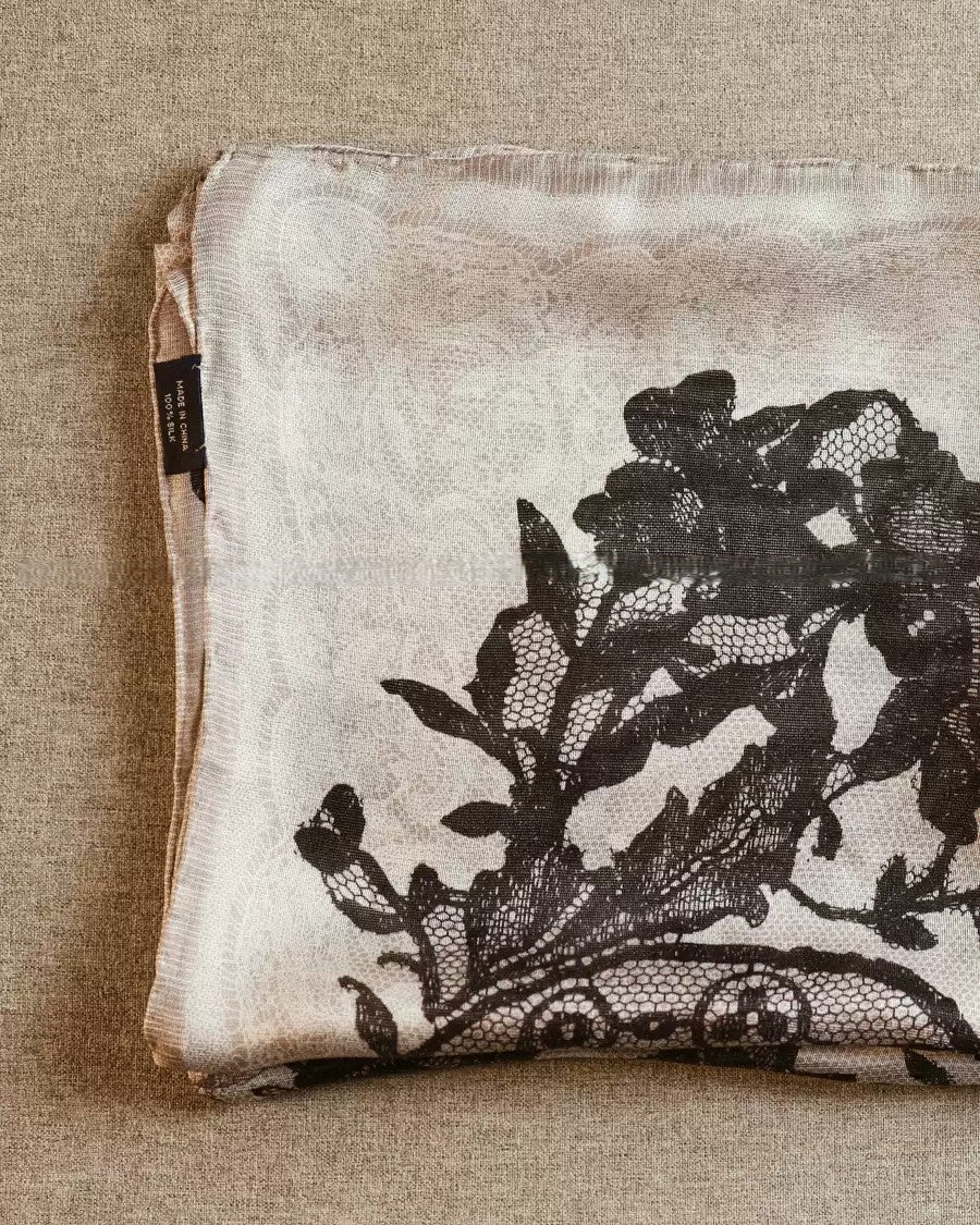 Close-up of hexagonal lace-mesh texture printed on Wildfool silk gauze scarf