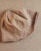 Wildfool Washed Linen Docker Cap in Khaki — front view showing six-panel construction