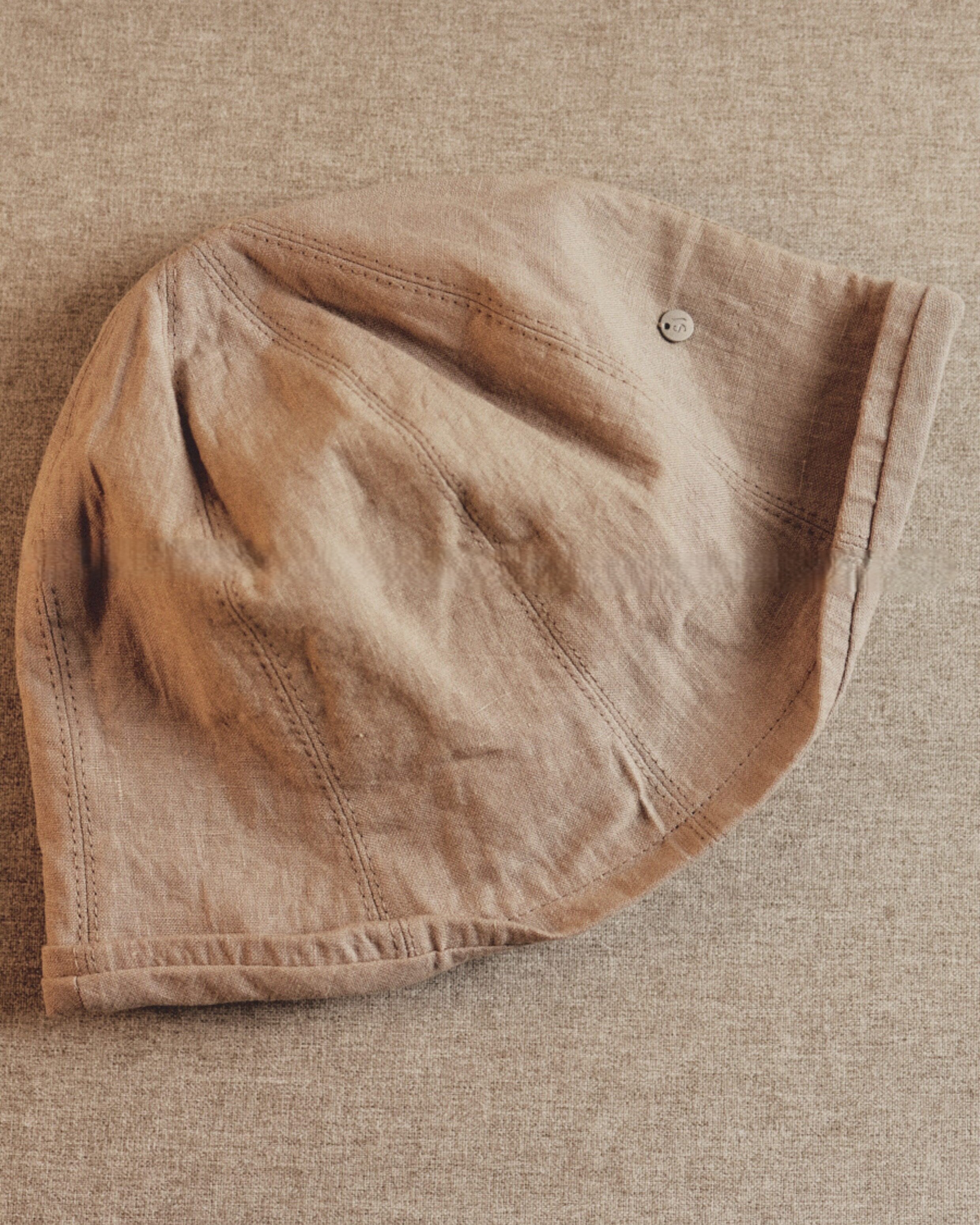Wildfool Washed Linen Docker Cap in Khaki — front view showing six-panel construction