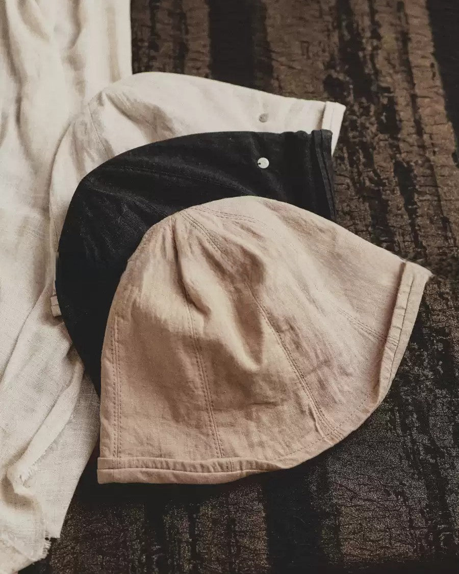 Wildfool Washed Linen Docker Cap in Khaki — front three-quarter view