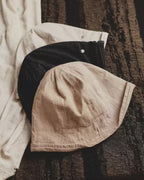 Wildfool Washed Linen Docker Cap in Khaki — front three-quarter view