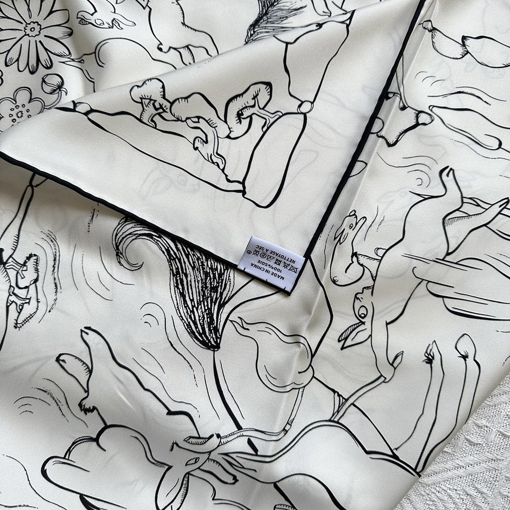 Close-up detail of hand-drawn rabbit illustrations on Wildfool 18mm mulberry silk scarf