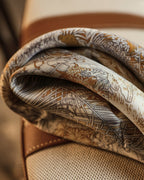 Wildfool 65cm silk wool scarf folded to show both gold and silver sides simultaneously