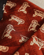Wildfool 85cm carriage scarf folded to show black and brick-red reversible sides together