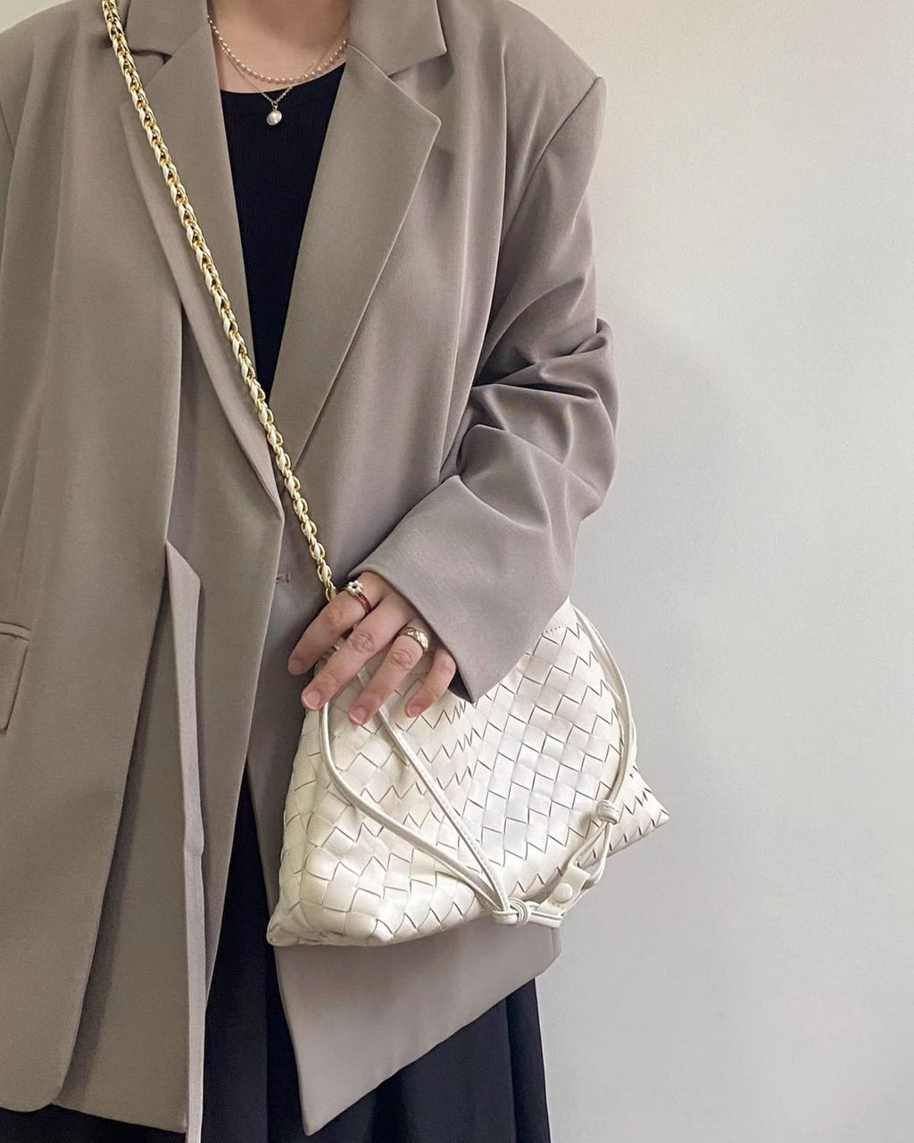Wildfool The Assisi Chain Pouch in Ivory, worn crossbody