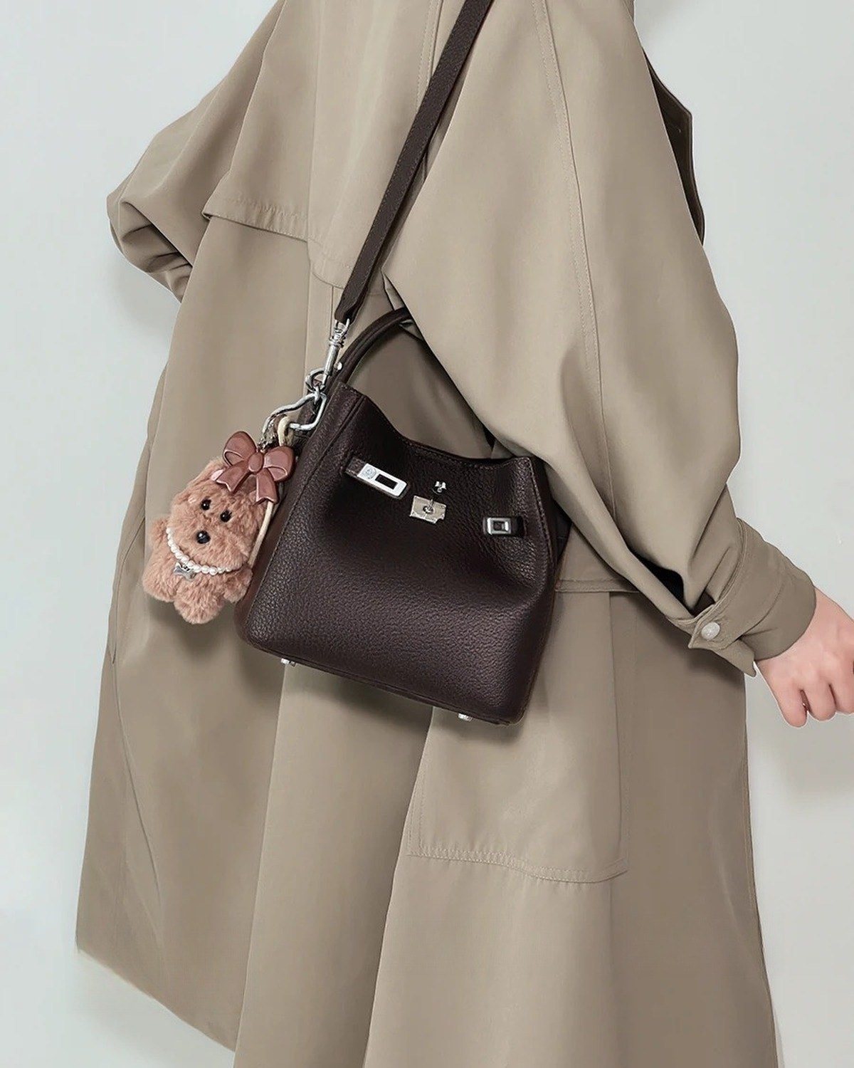 Wildfool The Orvieto Mini Bucket in Espresso, worn crossbody