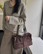 Wildfool The Urbino Patchwork Tote in Espresso, carried by hand