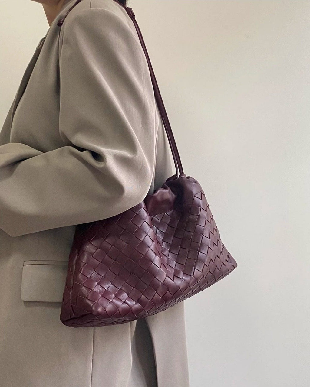 Wildfool The Assisi Chain Pouch in Burgundy, worn on the shoulder