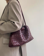 Wildfool The Assisi Chain Pouch in Burgundy, worn on the shoulder
