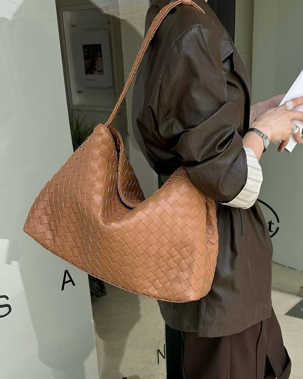 Wildfool The Treviso Woven Hobo in Caramel, worn on the shoulder
