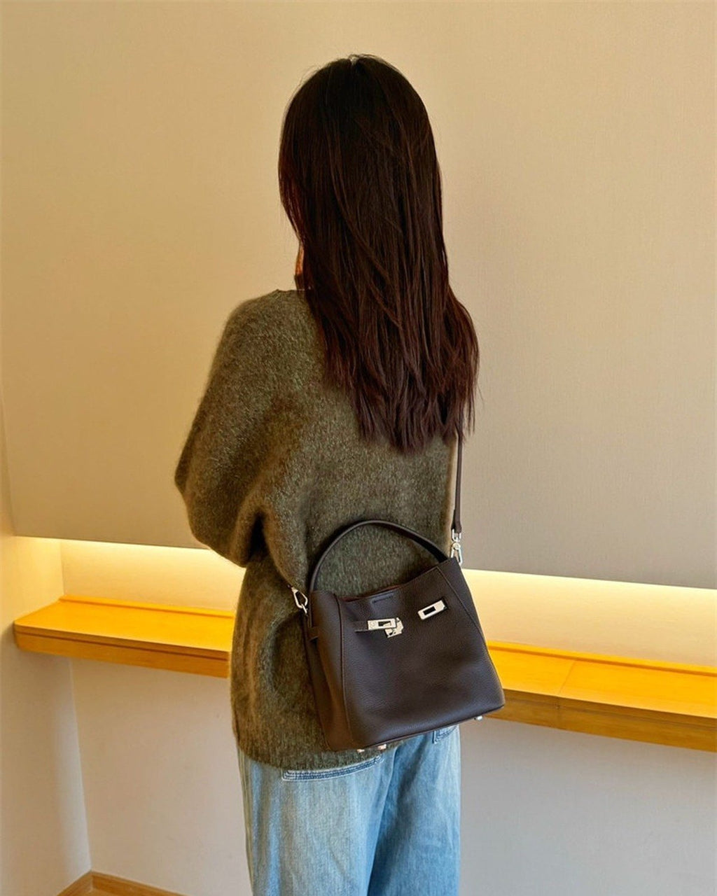 Wildfool The Orvieto Mini Bucket in Espresso, worn crossbody (3)