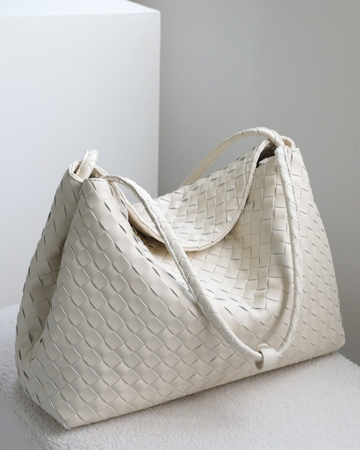 Wildfool The Treviso Woven Hobo in Ivory, three-quarter view