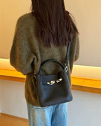 Wildfool The Orvieto Mini Bucket in Black, worn crossbody