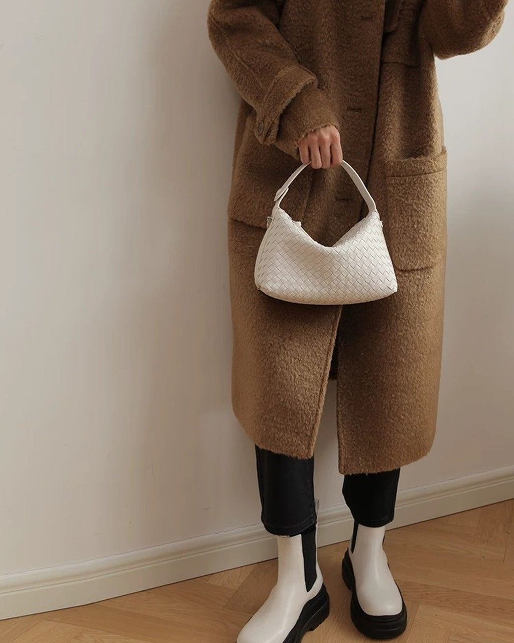 Wildfool The Parma Woven Mini Hobo in Ivory, carried by hand