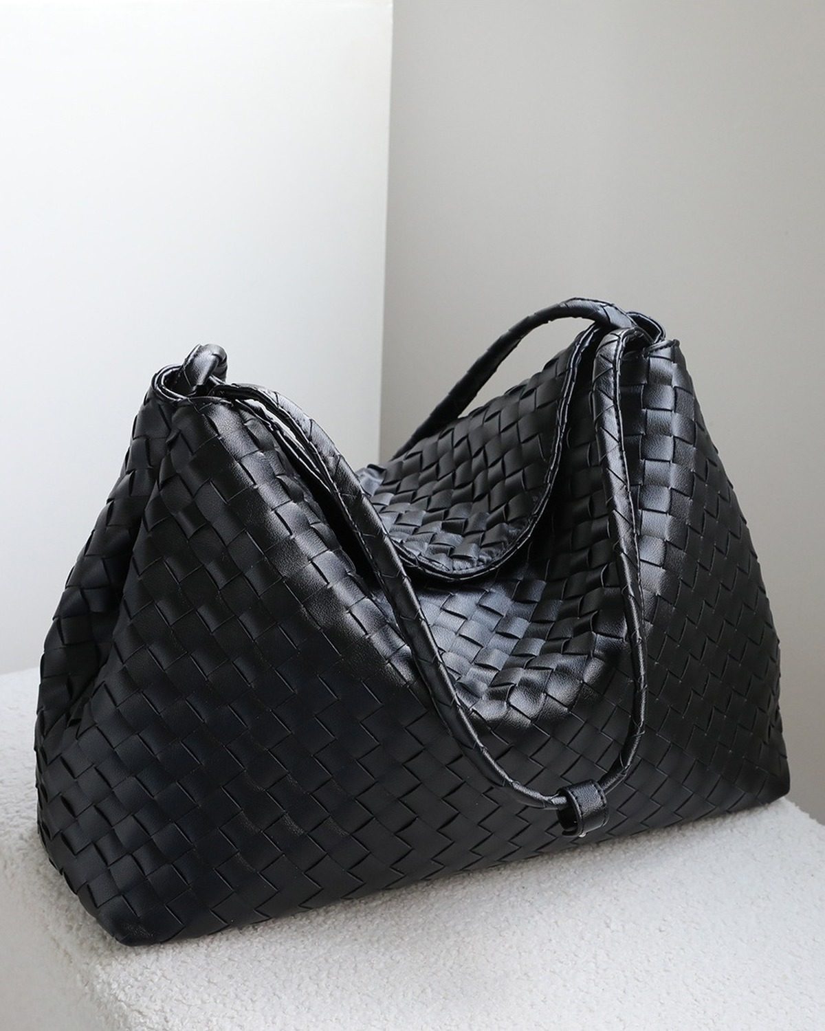 Wildfool The Treviso Woven Hobo in Black, three-quarter view