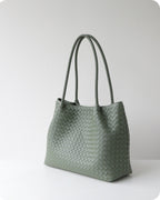Wildfool The Vicenza Woven Tote in Sage Green, three-quarter view