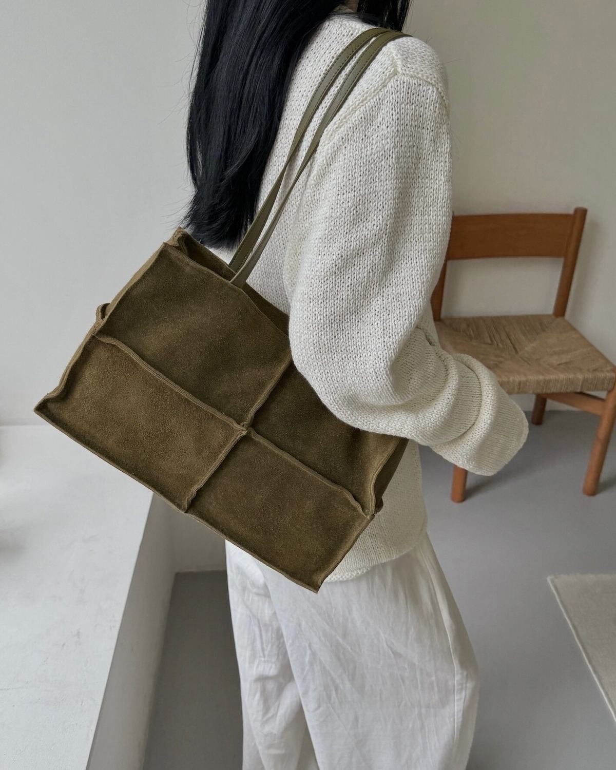 Wildfool The Urbino Patchwork Tote in Olive, worn on the shoulder