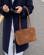 Wildfool The Padova Shoulder Tote in Cognac, worn on the shoulder (2)