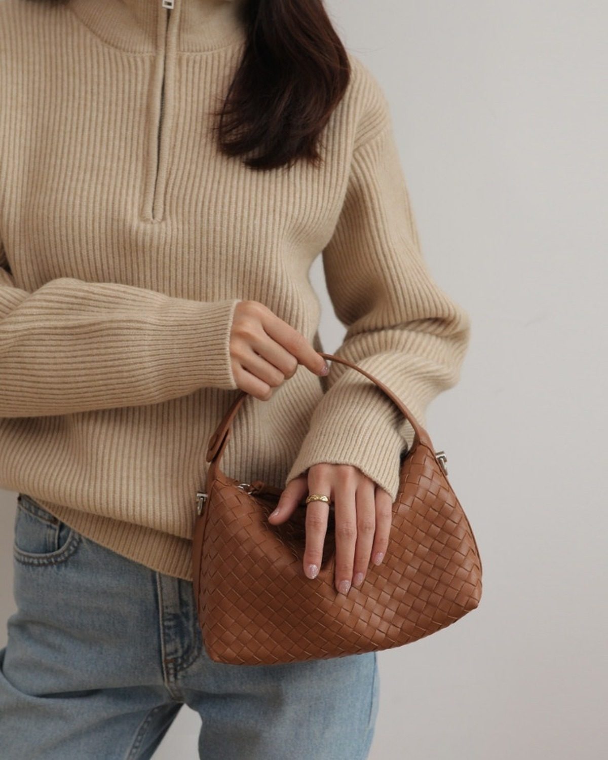 Wildfool The Parma Woven Mini Hobo in Caramel, carried by hand (2)