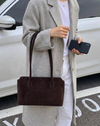 Wildfool The Padova Shoulder Tote in Espresso, worn on the shoulder
