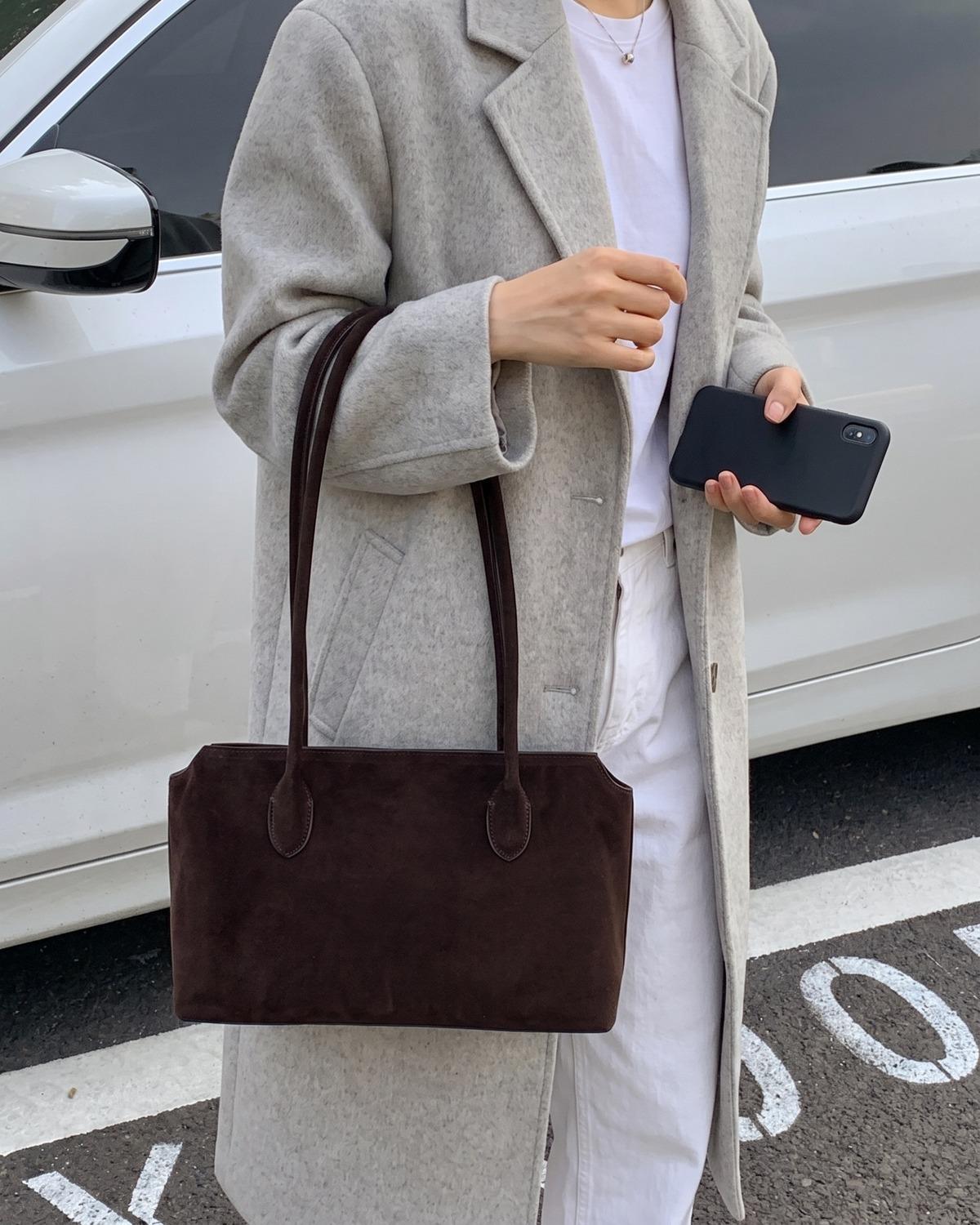 Wildfool The Padova Shoulder Tote in Espresso, worn on the shoulder