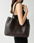 Wildfool The Vicenza Woven Tote in Espresso, worn on the shoulder