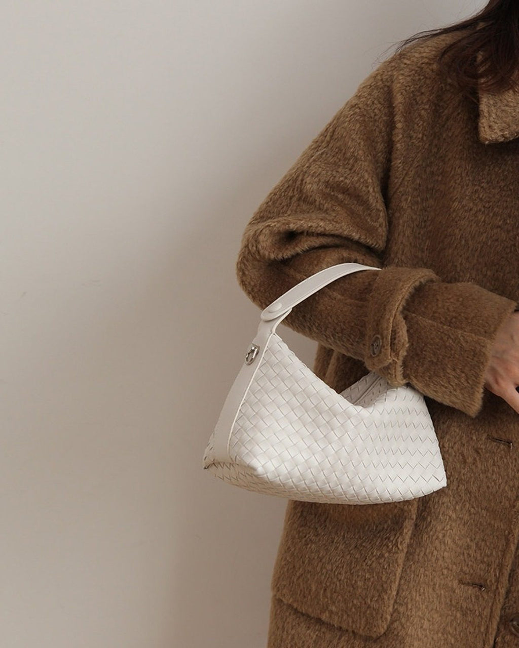 Wildfool The Parma Woven Mini Hobo in Ivory, carried by hand (2)