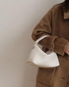 Wildfool The Parma Woven Mini Hobo in Ivory, carried by hand (2)