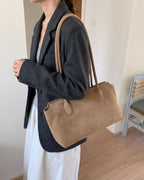 Wildfool The Padova Shoulder Tote in Sand, worn on the shoulder (2)