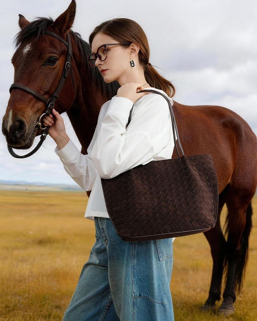 Wildfool The Perugia Woven Tote in Chocolate, worn on the shoulder (3)