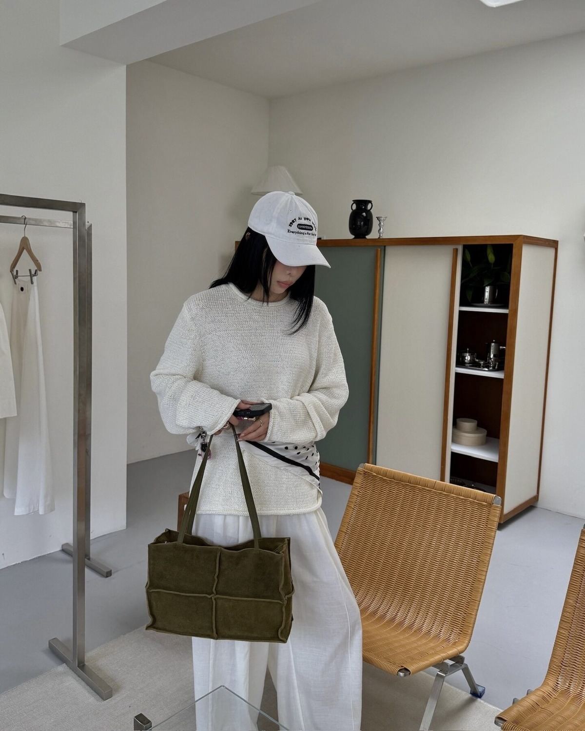 Wildfool The Urbino Patchwork Tote in Olive, carried by hand (2)