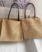 The Grand Market Tote - black and brown straps side by side