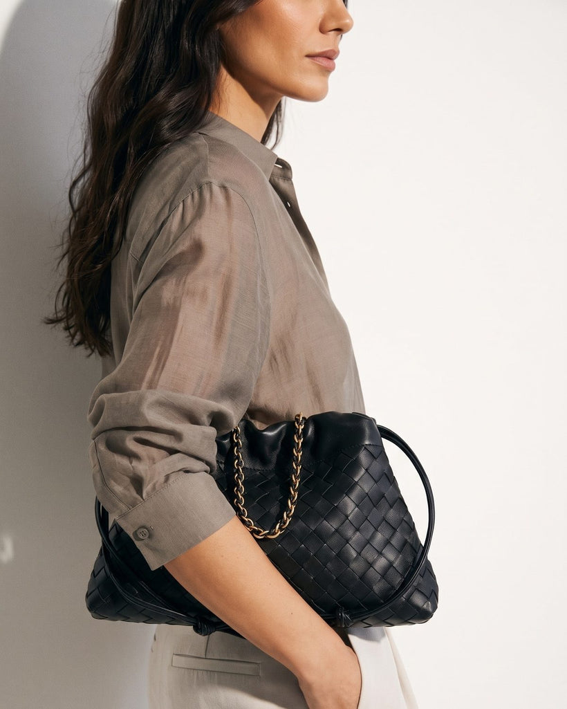Wildfool The Assisi Chain Pouch in Black, styled and worn (2)