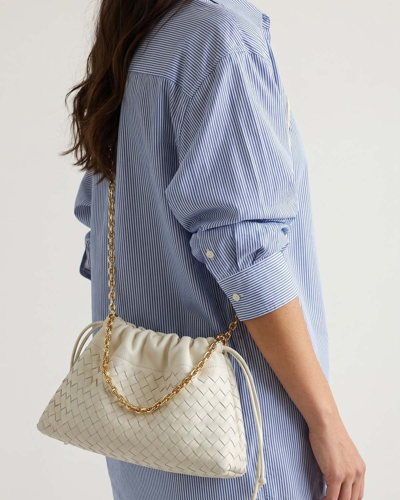 Wildfool The Assisi Chain Pouch in Ivory, styled and worn