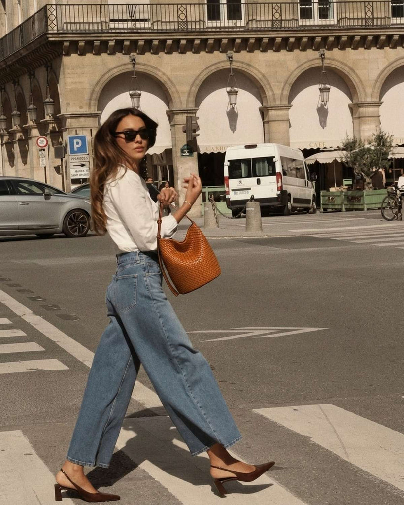 The Lecce Woven Bucket worn on the shoulder