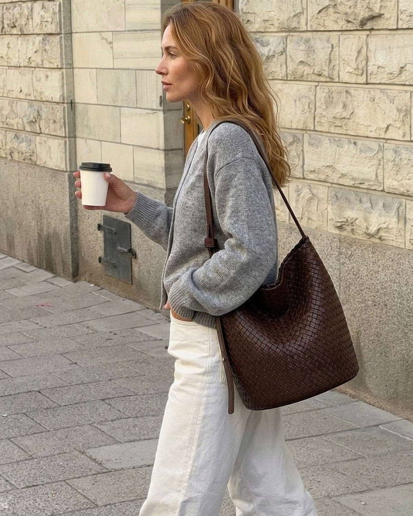 The Lecce Woven Bucket worn on the shoulder